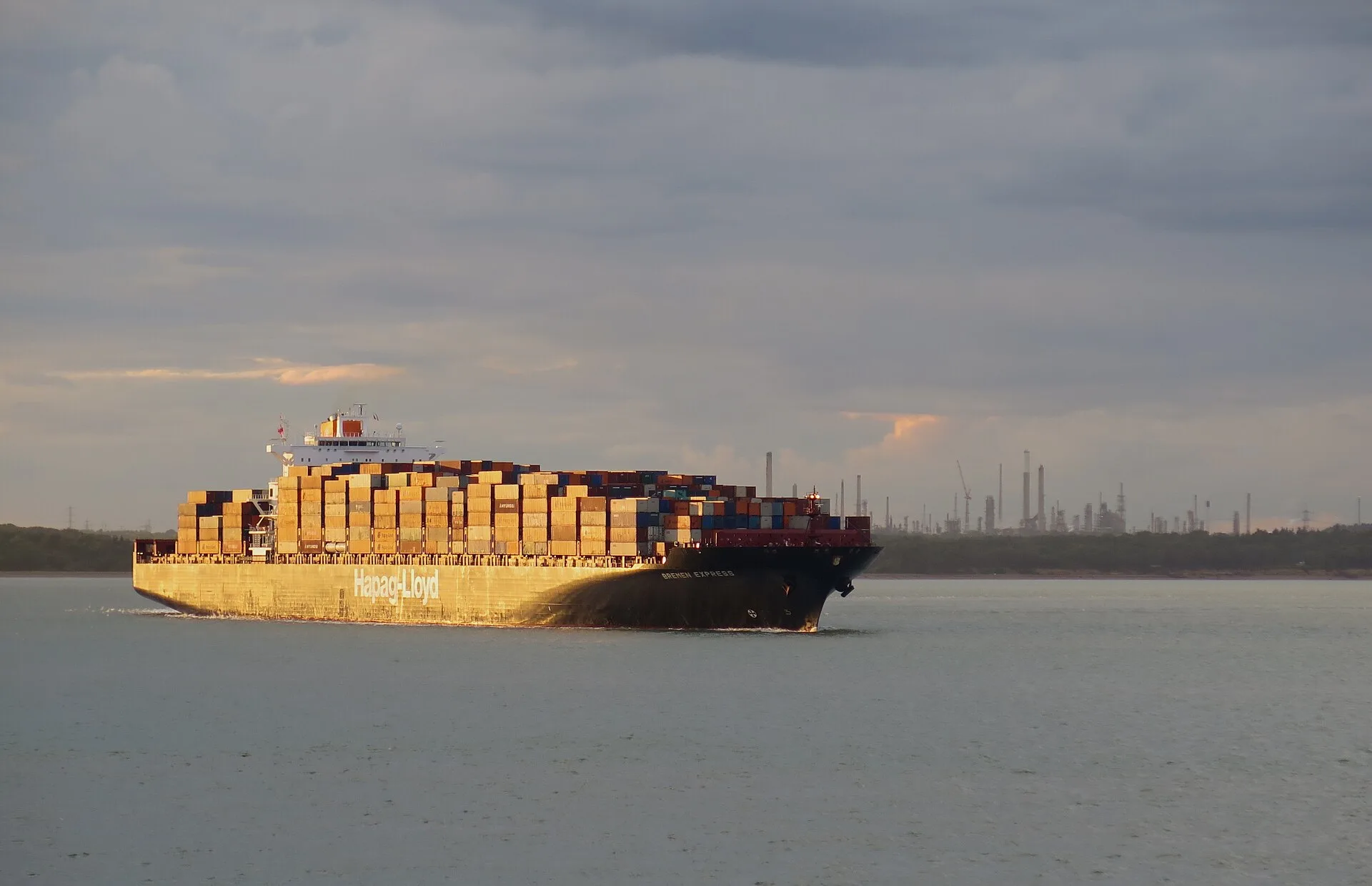 Loaded container ship under way in coastal waters